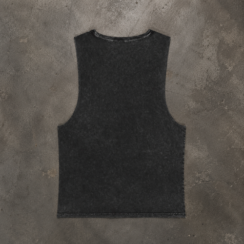 Plain back shot o MCC Stonewashed Tank Layed flat on a concrete floor 